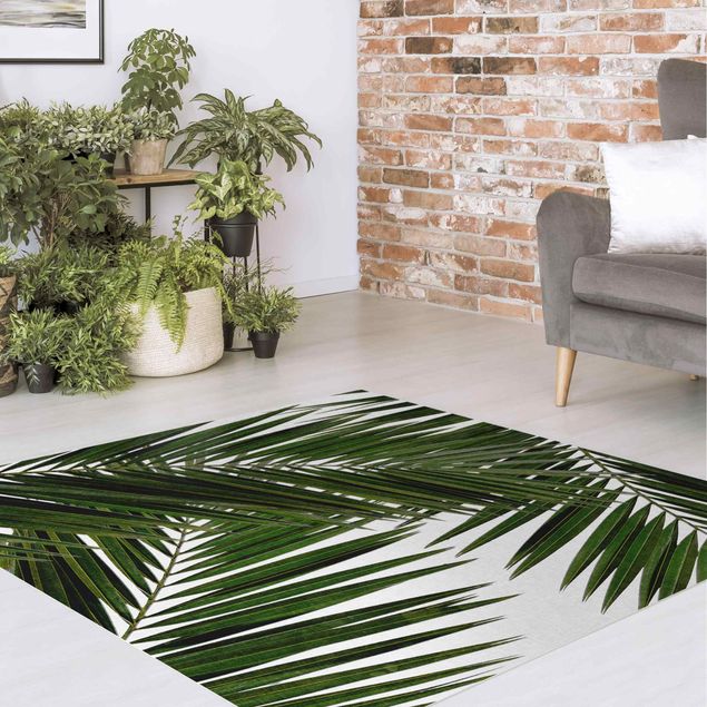 Outdoor Teppich Blick durch grüne Palmenblätter