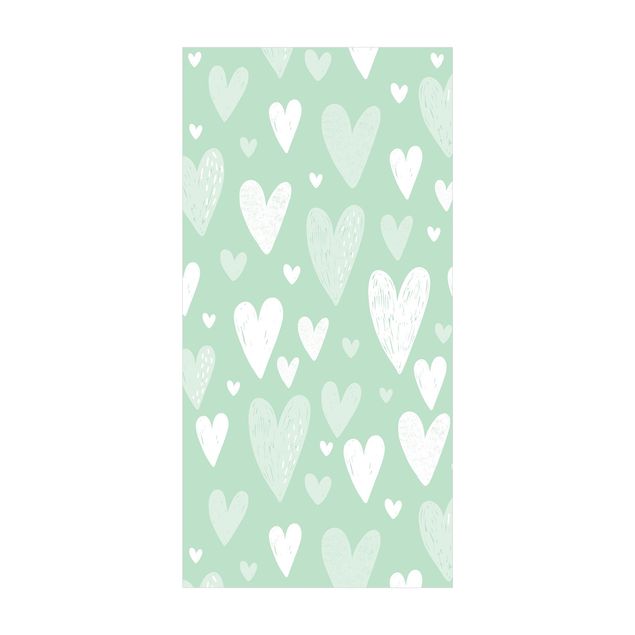 Kleine Teppiche Kleine und große gezeichnete Weiße Herzen auf Grün