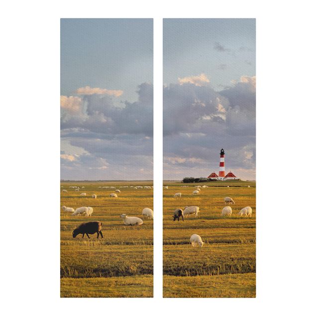 Leinwandbild 2-teilig - Nordsee Leuchtturm mit Schafsherde - Panoramen hoch 1:3
