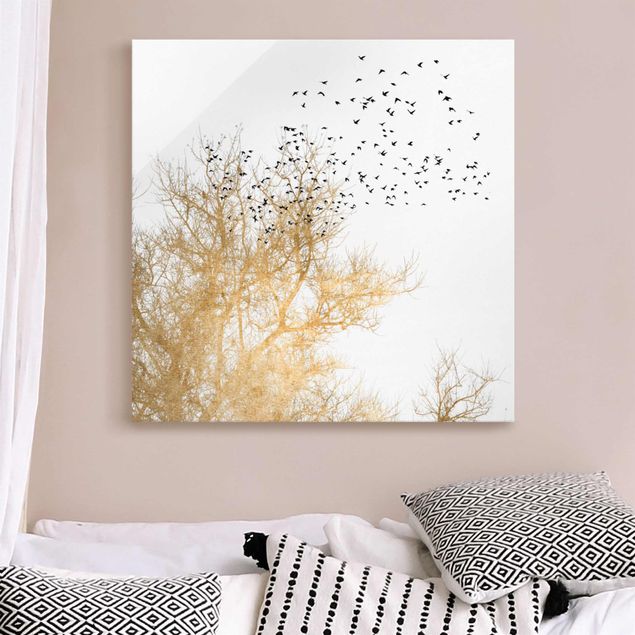 Magnettafel Glas Vogelschwarm vor goldenem Baum