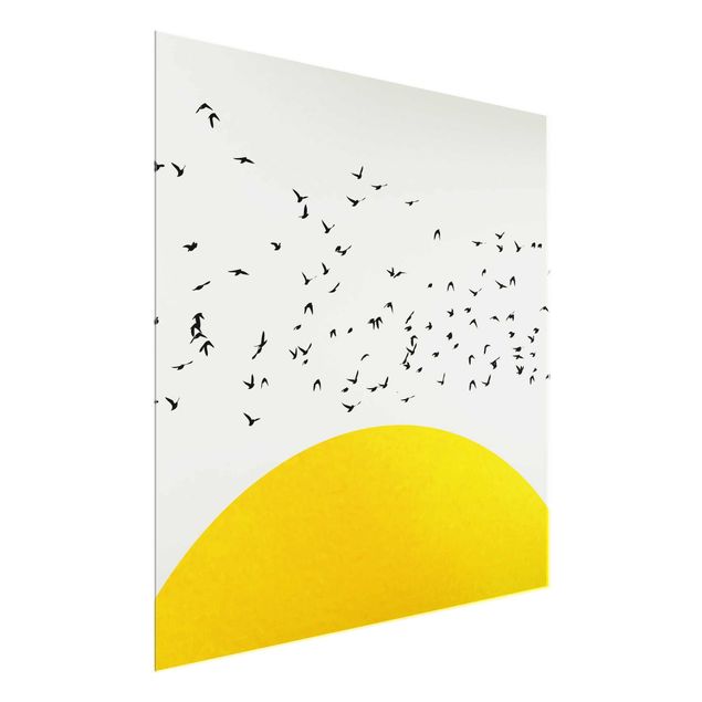 Glasbild - Vogelschwarm vor gelber Sonne - Quadrat 1:1