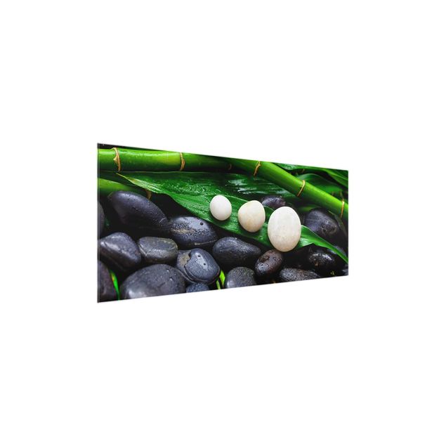 Glasbild - Grüner Bambus mit Zen Steinen - Panorama