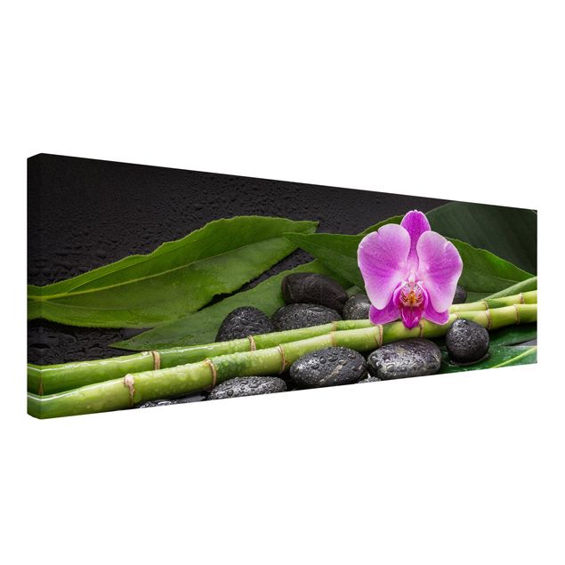 Leinwandbild - Grüner Bambus mit Orchideenblüte - Panorama 1:3