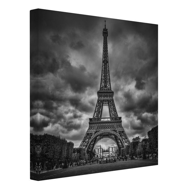 Leinwandbild - Eiffelturm vor Wolken schwarz-weiß - Quadrat 1:1