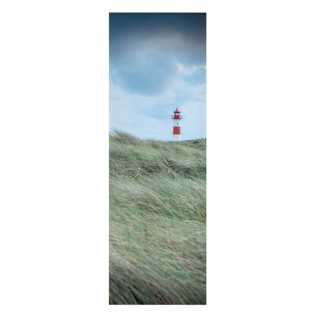 Leinwandbild - Stürmische Zeiten am Leuchtturm - Panorama Hochformat 1:3