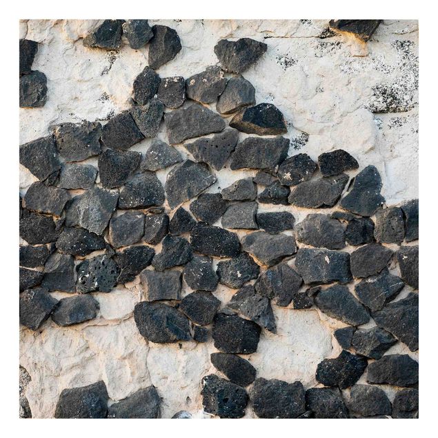 Leinwandbild - Mauer mit Schwarzen Steinen - Quadrat 1:1