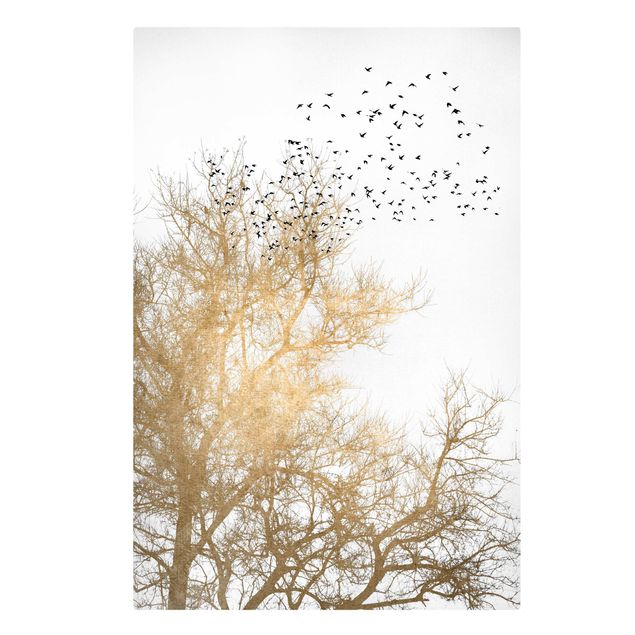 Leinwandbild - Vogelschwarm vor goldenem Baum - Hochformat 3:2
