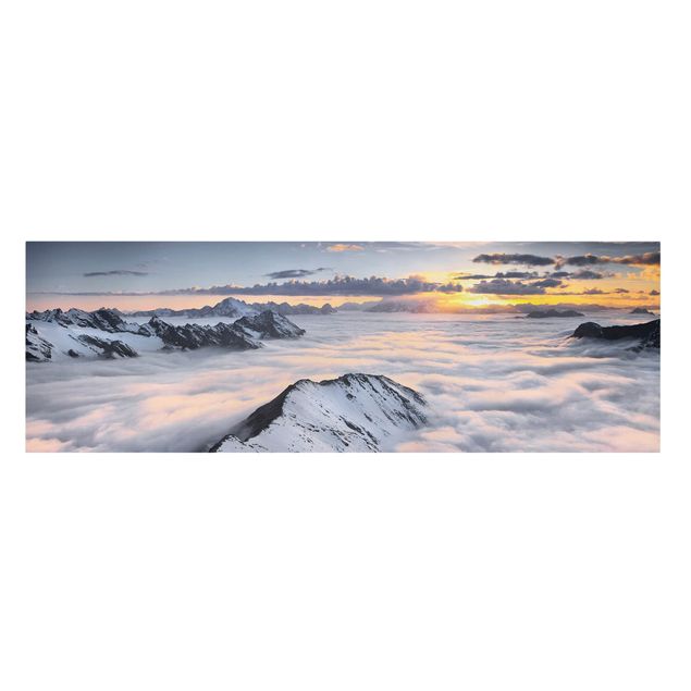 Leinwandbild - Blick über Wolken und Berge - Panorama Quer