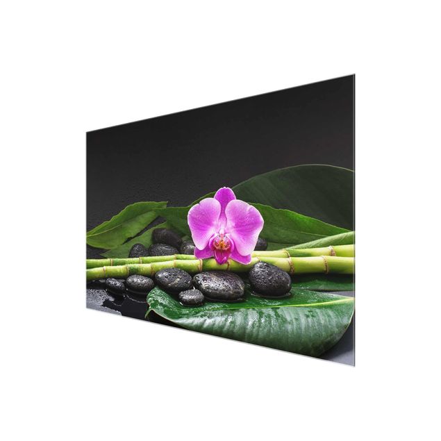 Glasbild - Grüner Bambus mit Orchideenblüte - Querformat 2:3
