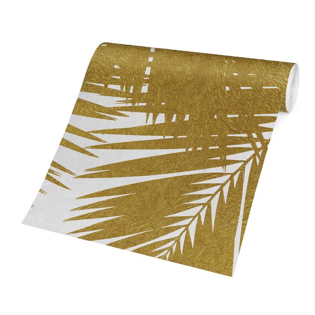 Fototapete - Blick durch goldene Palmenblätter