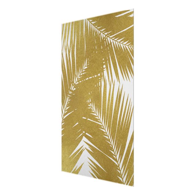Glasbild - Blick durch goldene Palmenblätter - Hochformat