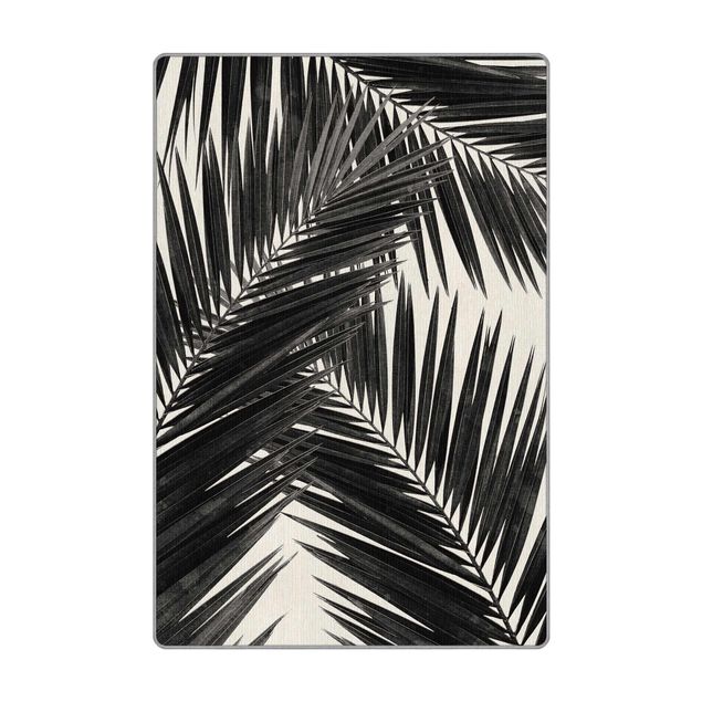 Webteppich Blick durch Palmenblätter schwarz weiß