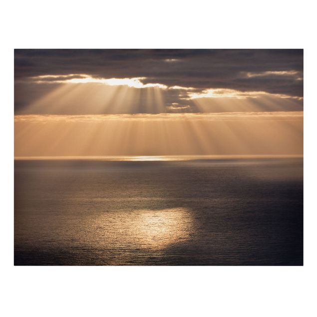 Leinwandbild - Sonnenstrahlen über dem Meer - Querformat 3:4