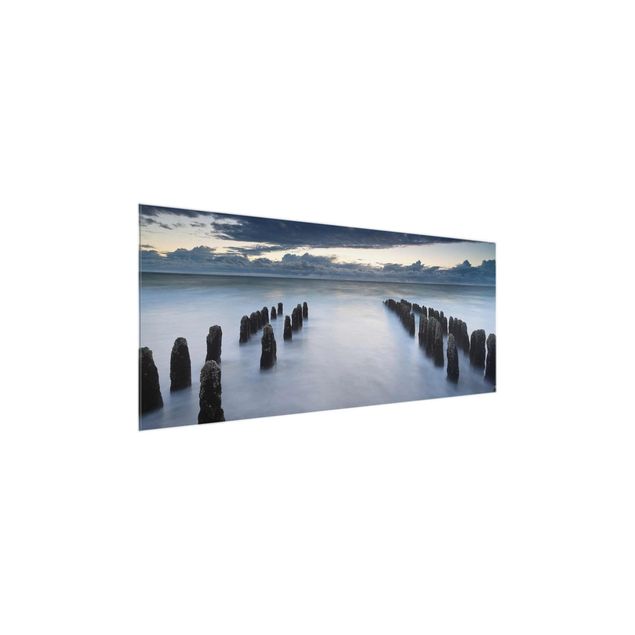 Glasbild - Holzbuhnen in der Nordsee auf Sylt - Panorama Quer