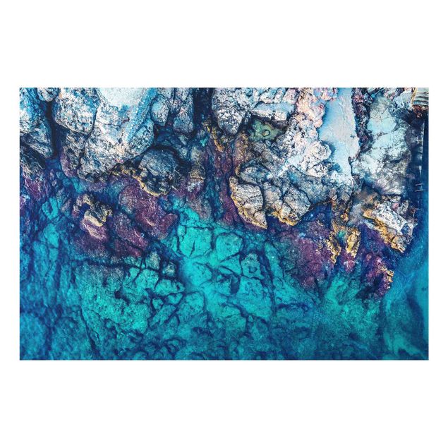 Glasbild - Top View Farbige Felsenküste - Querformat