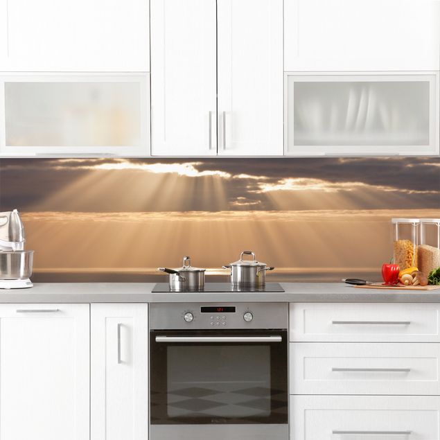 Küchenrückwand - Sonnenstrahlen über dem Meer