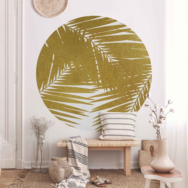 Runde Tapete selbstklebend - Blick durch goldene Palmenblätter