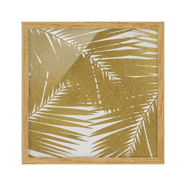 Bild mit Rahmen - Blick durch goldene Palmenblätter - Quadrat