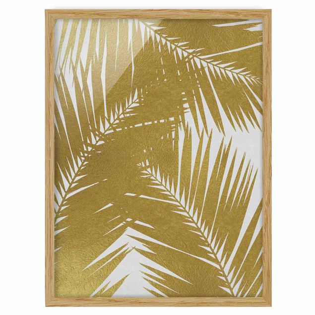 Bild mit Rahmen - Blick durch goldene Palmenblätter - Hochformat