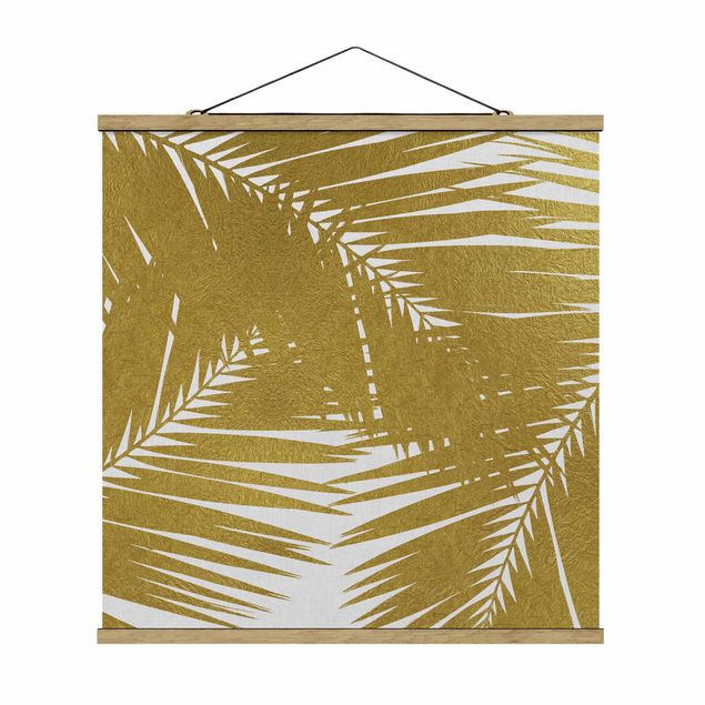 Stoffbild mit Posterleisten - Blick durch goldene Palmenblätter - Quadrat 1:1