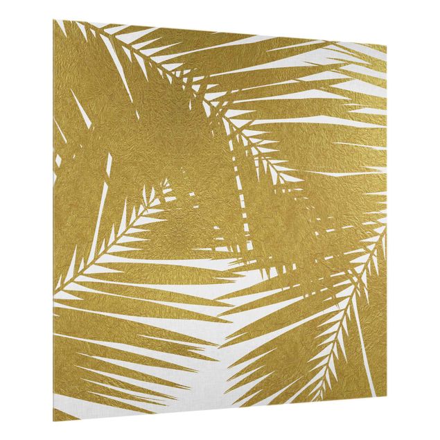 Spritzschutz Glas - Blick durch goldene Palmenblätter - Quadrat 1:1