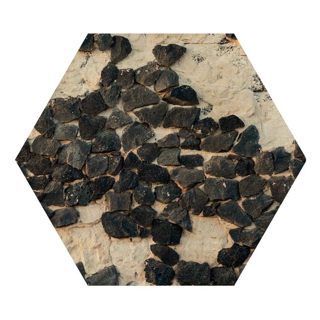 Hexagon Bild Holz - Mauer mit Schwarzen Steinen